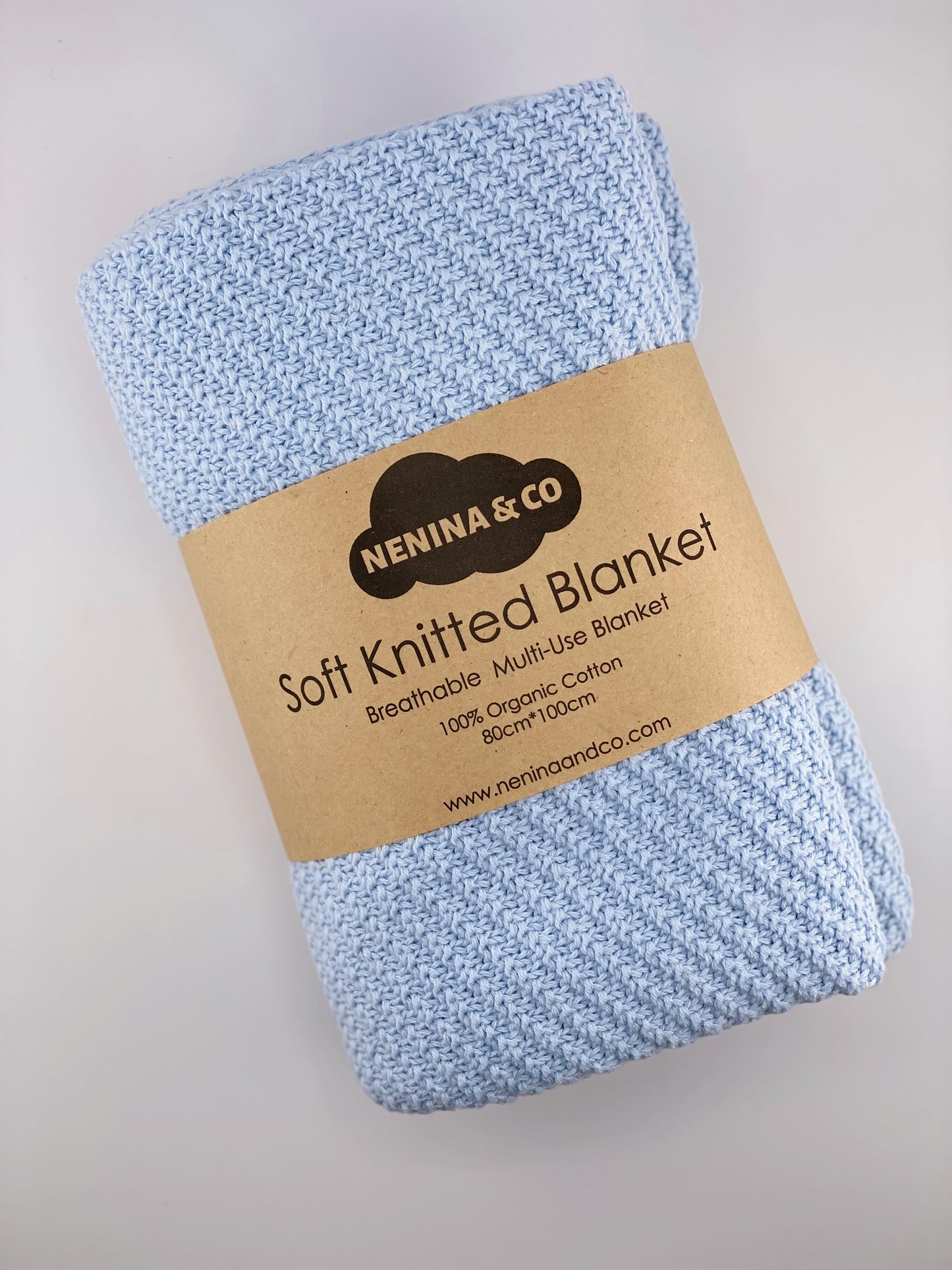 
                  
                    Cobertor de malha azul claro 100% algodão orgânico Nenina &amp; Co
                  
                