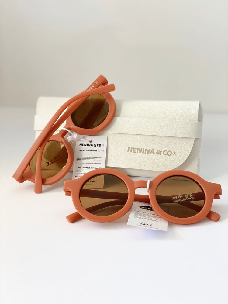 
                  
                    Óculos de sol laranja sustentável para bebês Nenina &amp; Co 
                  
                